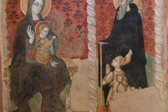 24 Madonna col Bambino, Sant'Antonio abate e committente